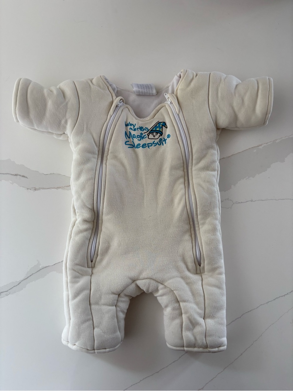 Baby Merlin Magic Sleepsuit in Cream by The Magic Sleepsuit